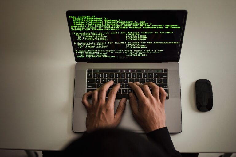 man-typing-computer